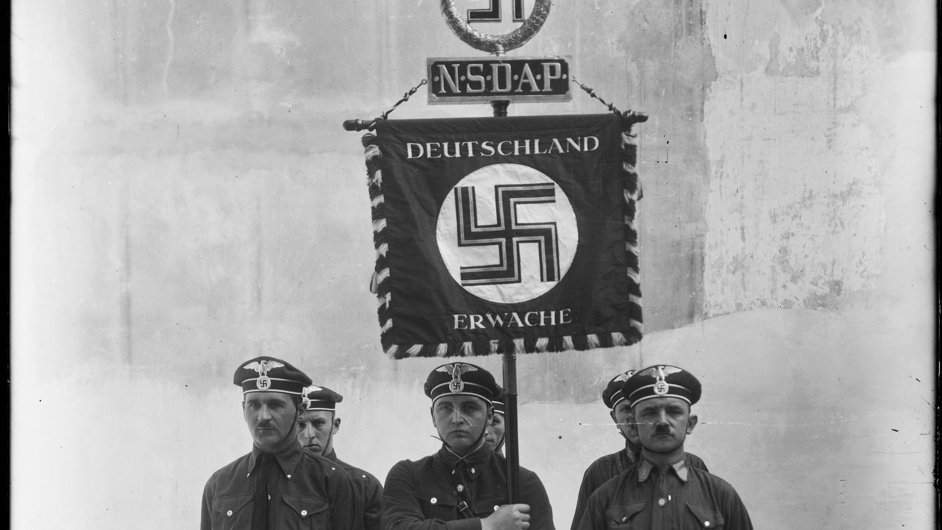 File:Ideen zur SS Uniformierung Nazi Party Schutzstaffel paramilitary test uniform 1925? Kratzschen visorless cap eagle-and-swastika Lederhosen Deutschland Erwache standard etc National Archives NARA Unrestricted No copyright 242-HF-0825 001.jpg