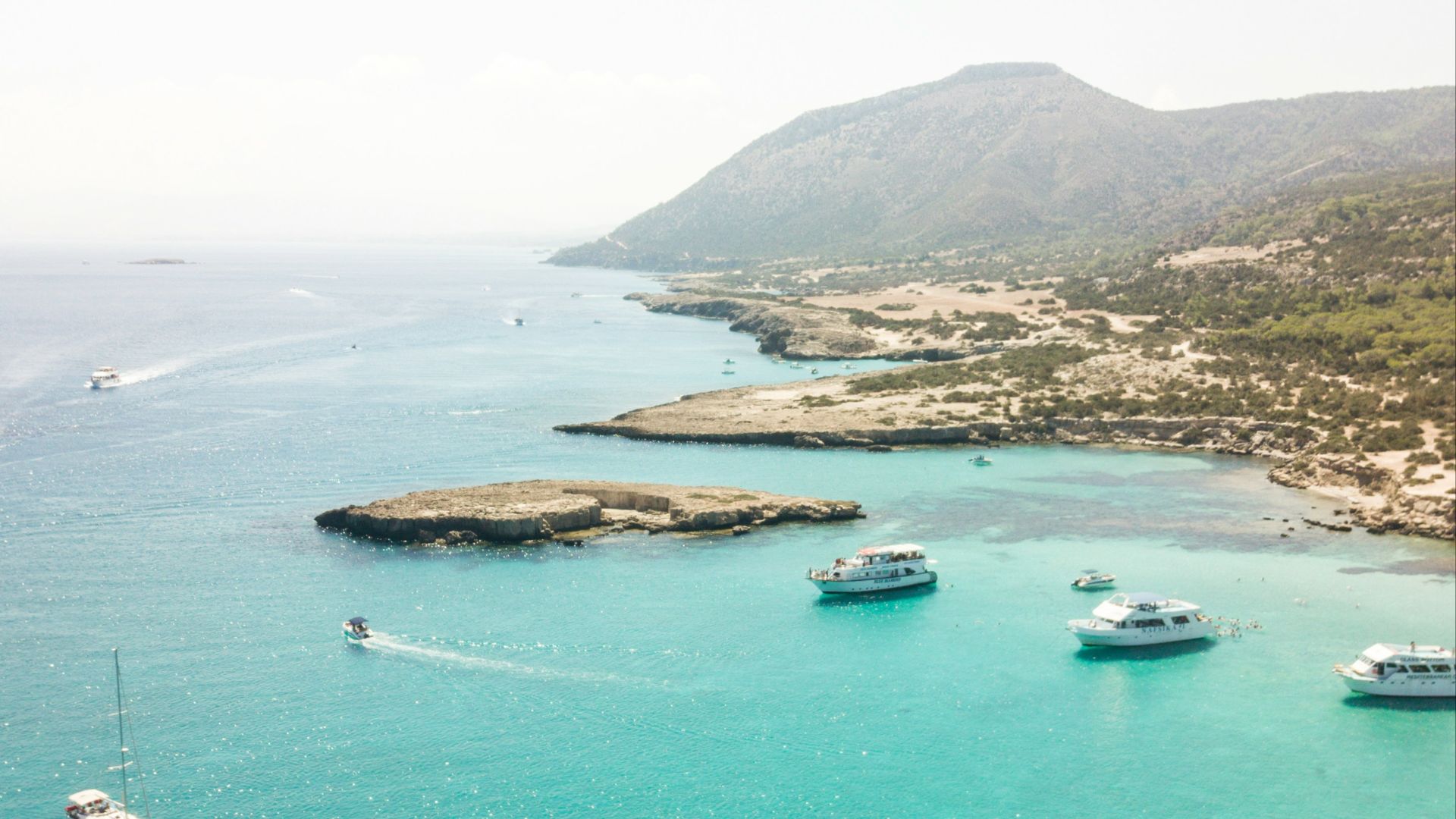 yachts on body of water at daytime