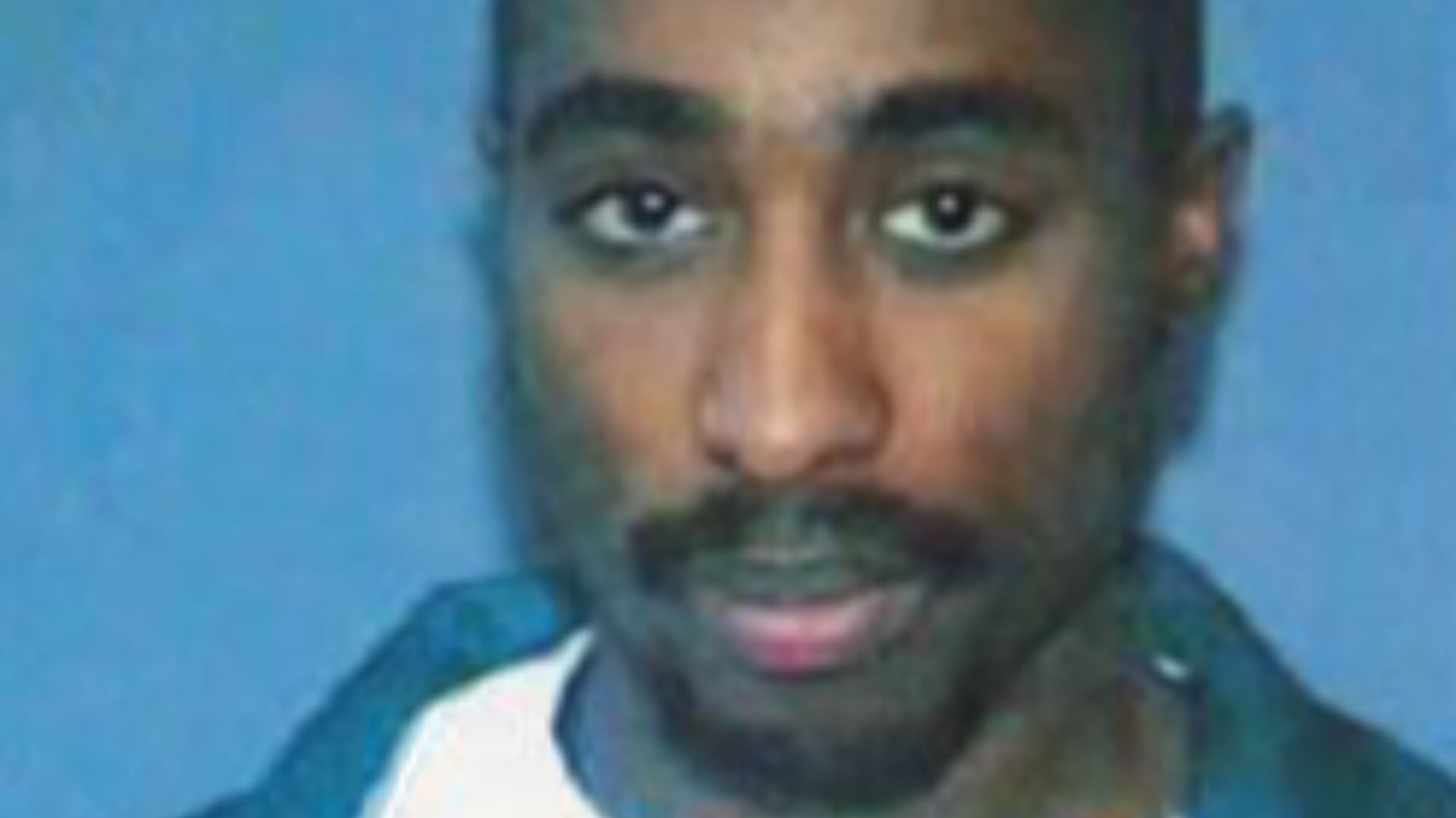 File:Tupac Shakur driver's license photo (1996).png