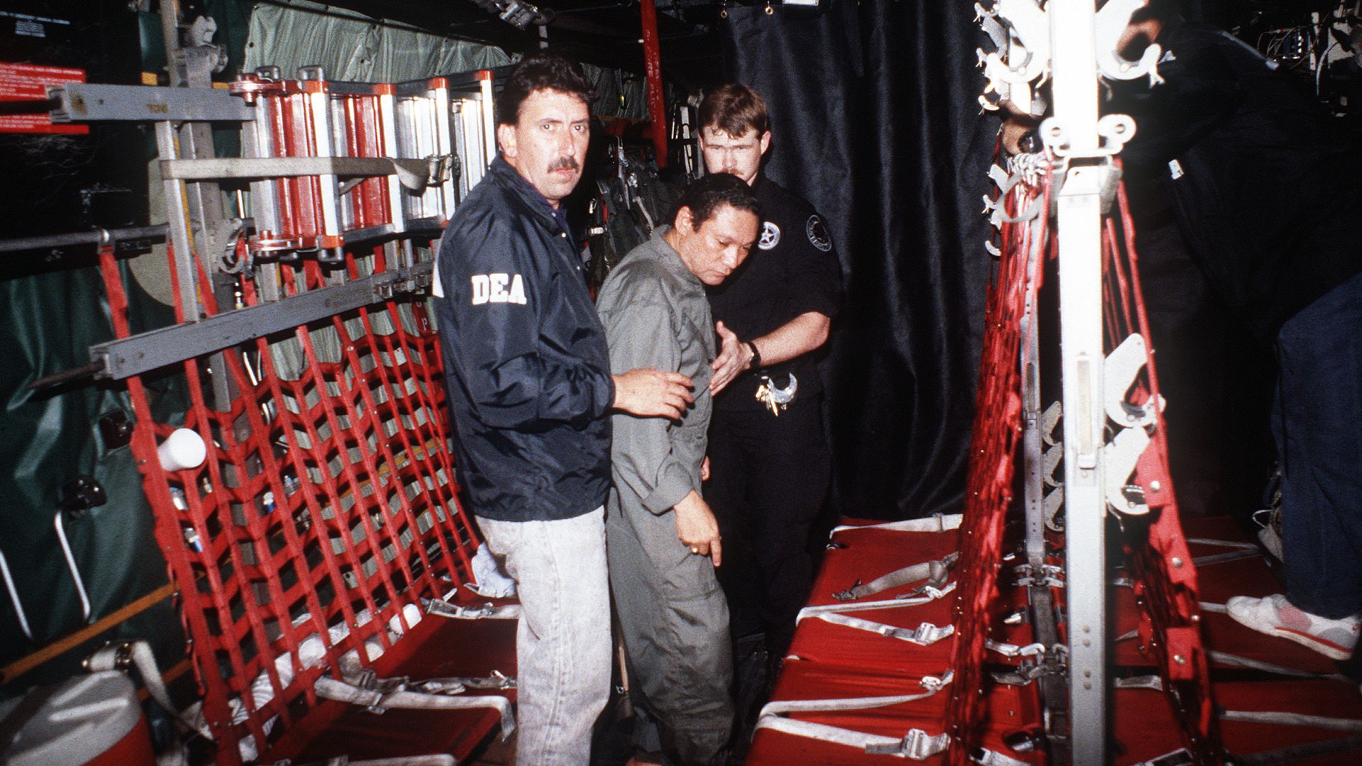 File:Manuel Noriega with agents from the U.S. DEA.jpg