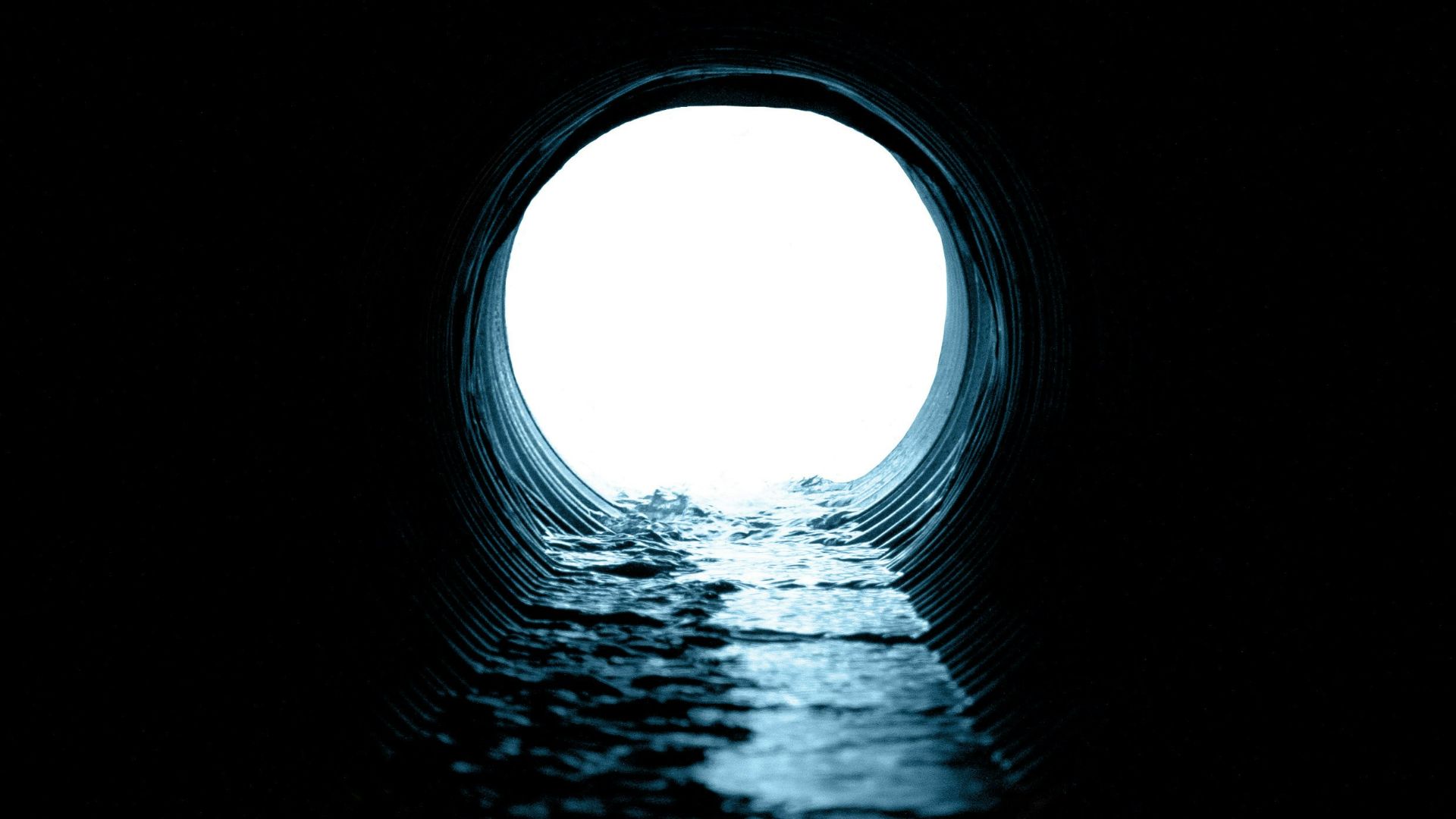 black and white tunnel with light