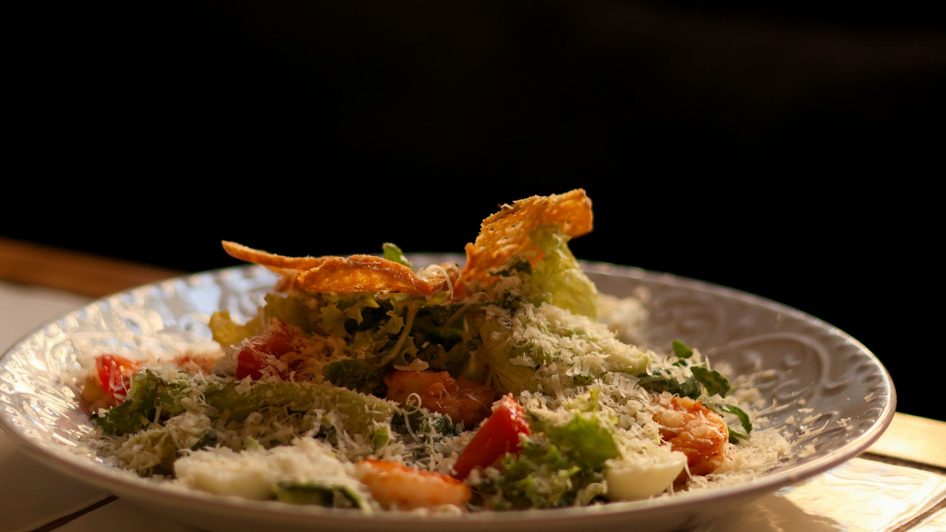 a white plate topped with food on top of a table