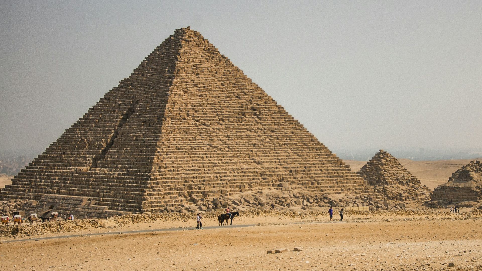 brown pyramid under gray sky during daytime