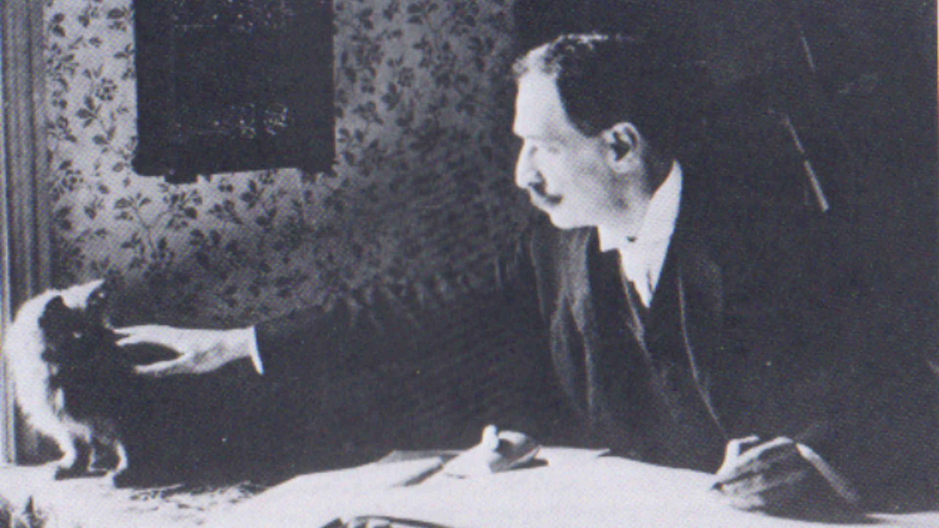 File:Louis Wain at his drawing table 1890.png