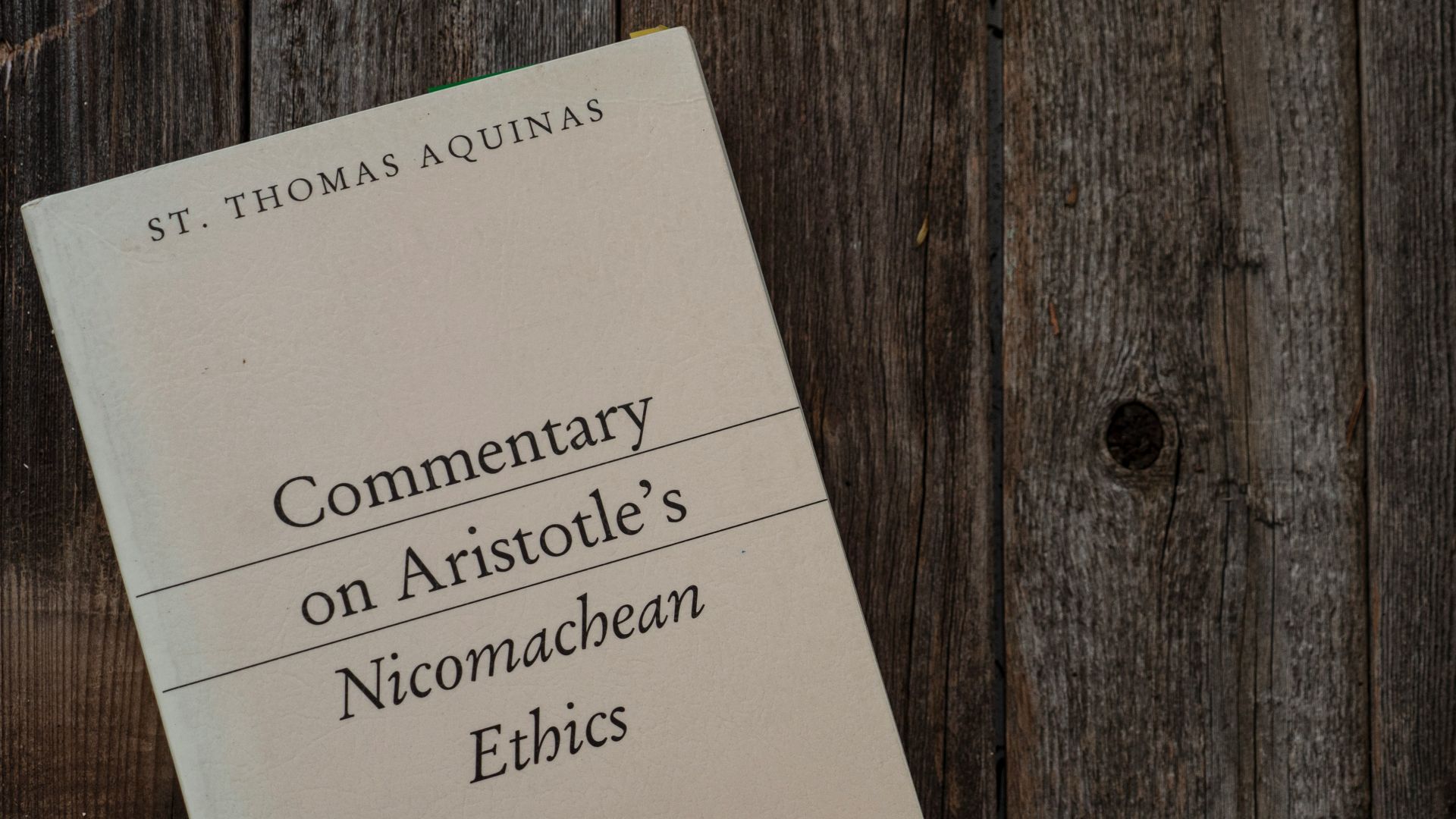 white printer paper on brown wooden surface