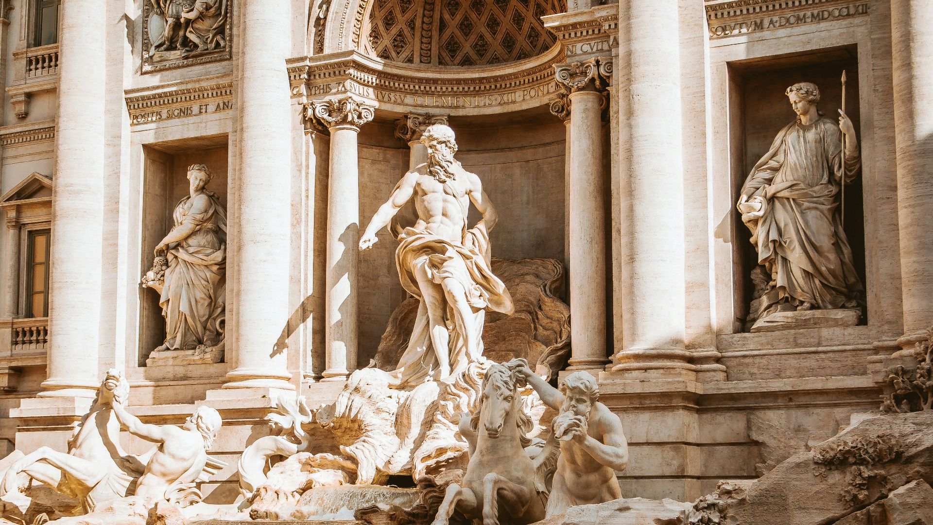 people and horses statue monument at daytime