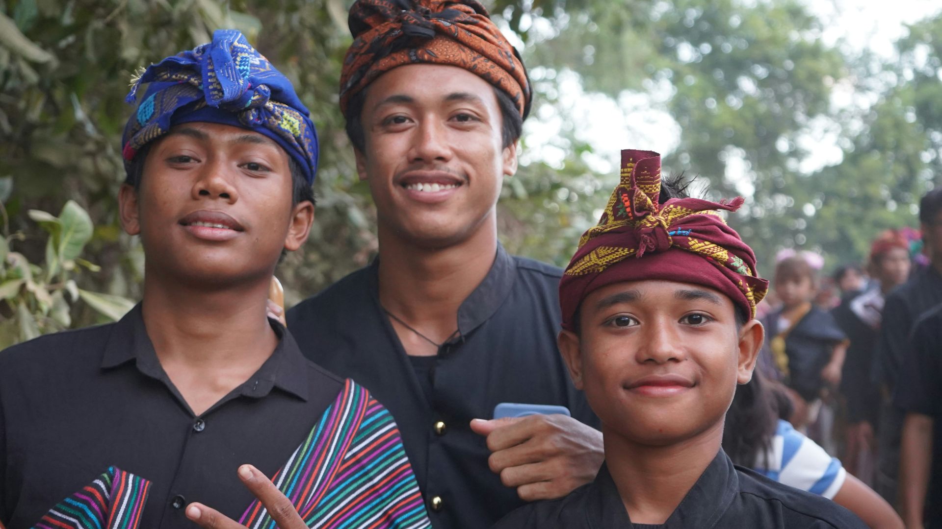 A group of people standing next to each other