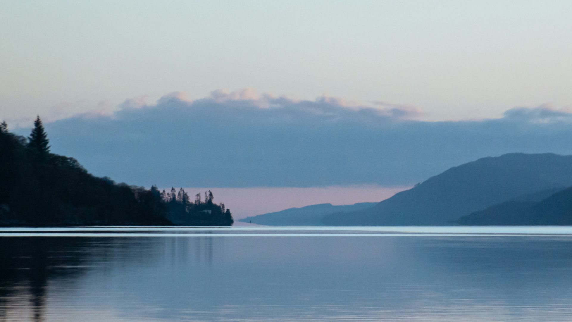 a large body of water surrounded by mountains
