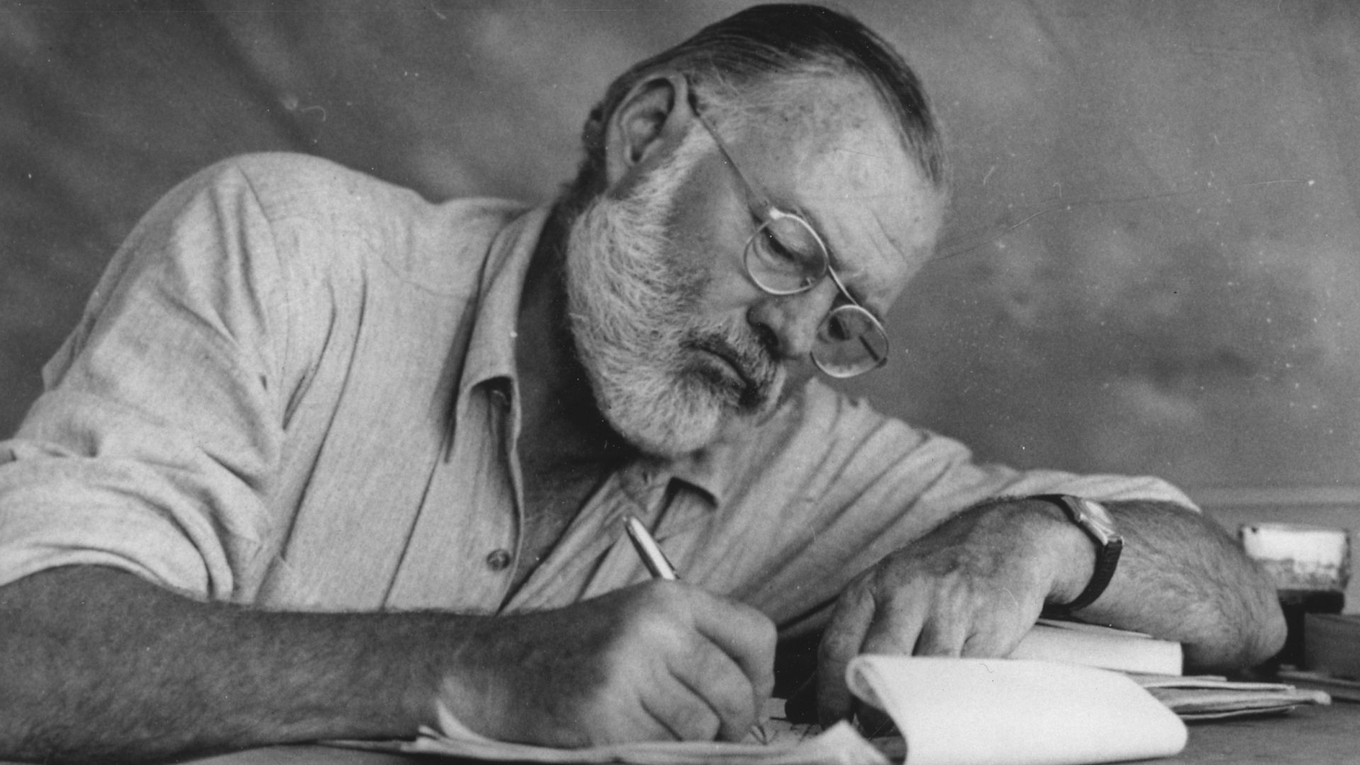File:Ernest Hemingway Writing at Campsite in Kenya - NARA - 192655.jpg