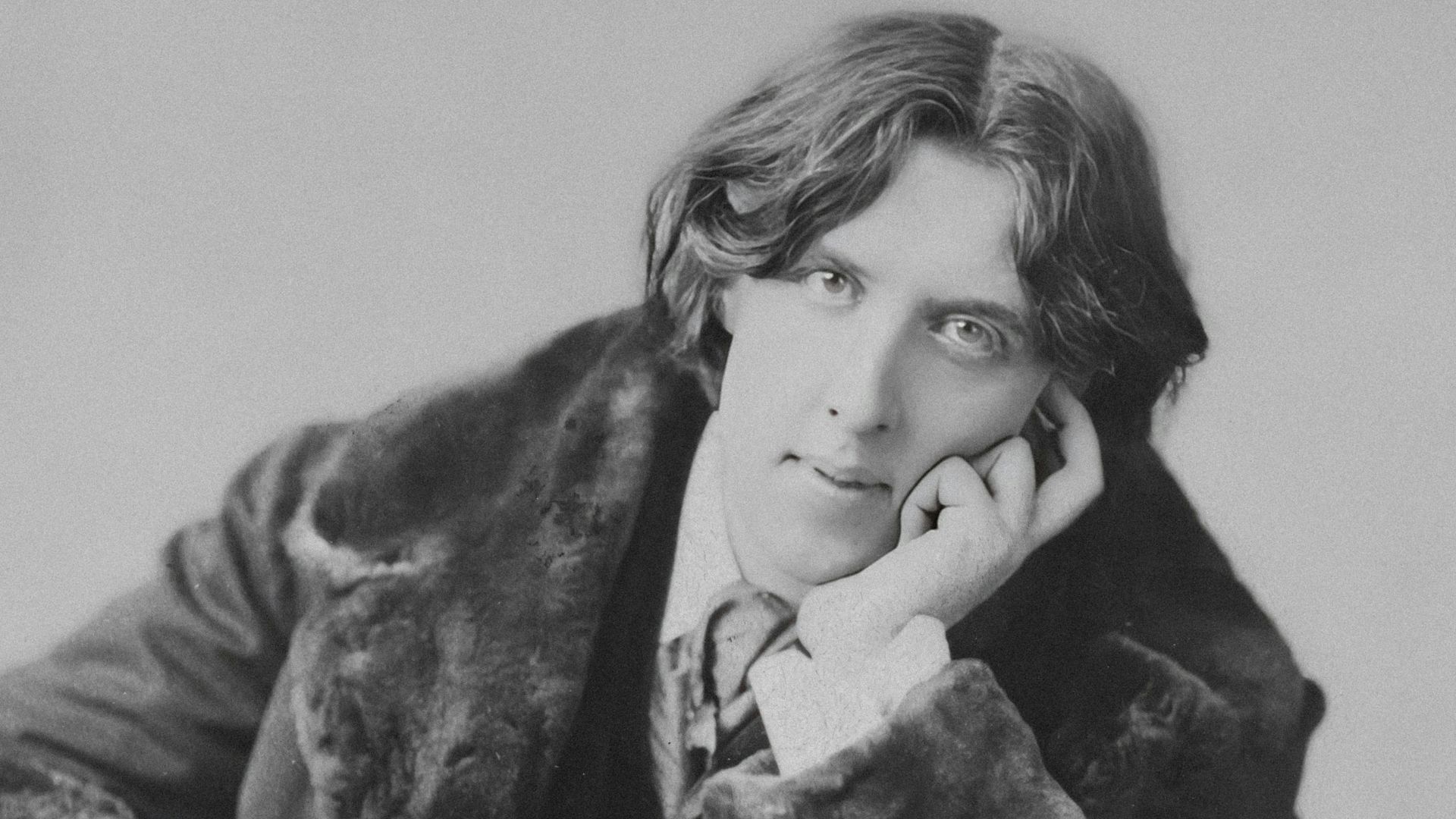 An old photo of a man in a fur coat