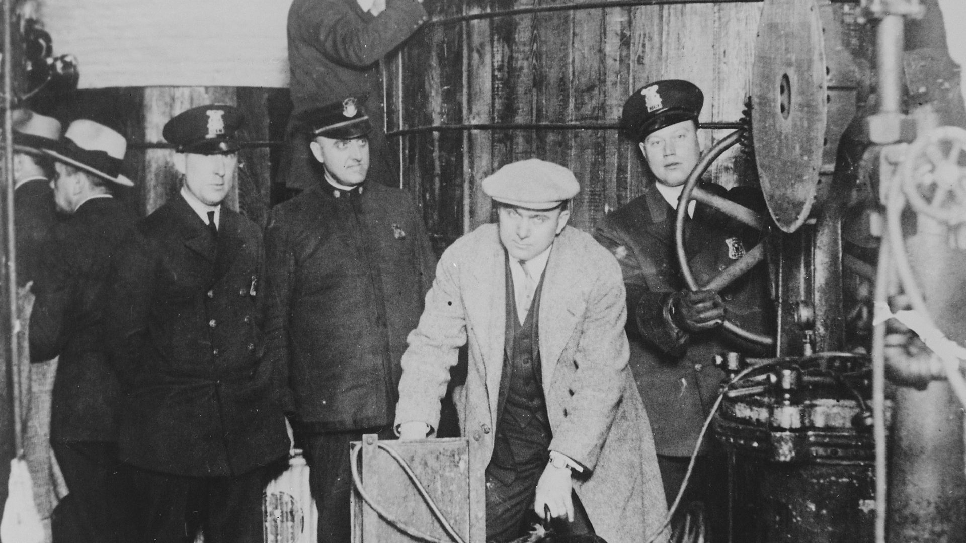 File:Detroit police inspecting equipment found in a clandestine underground brewery during the prohibition era - NARA - 541928.jpg