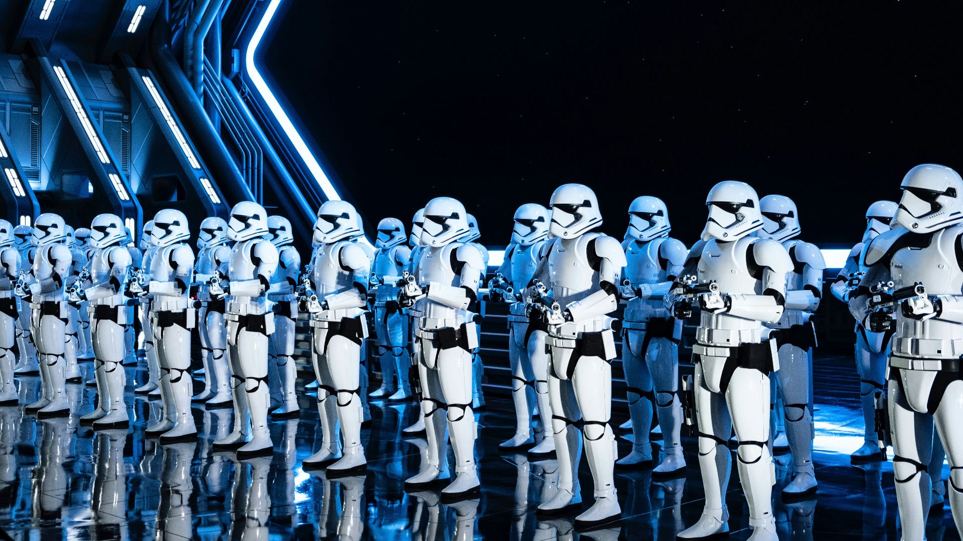 white robot toy on black background