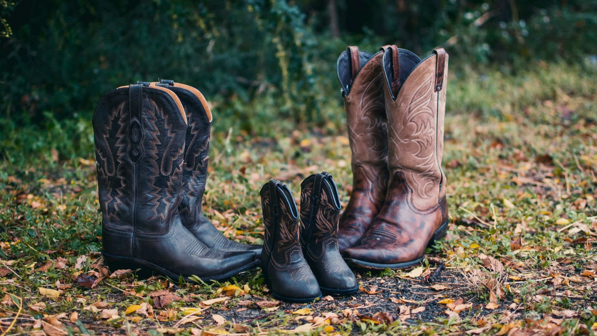 brown leather cowboy boots on ground