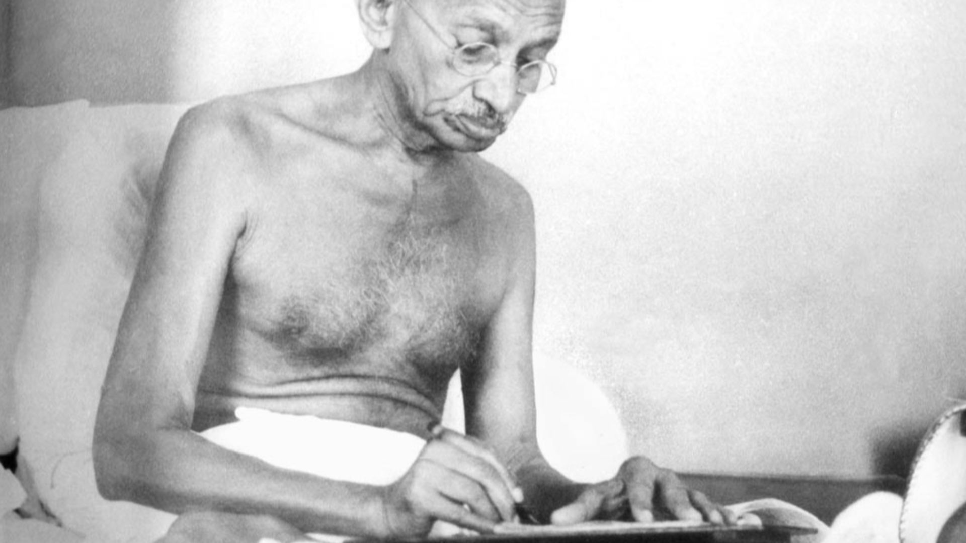 File:Gandhi writing Aug1942.jpg