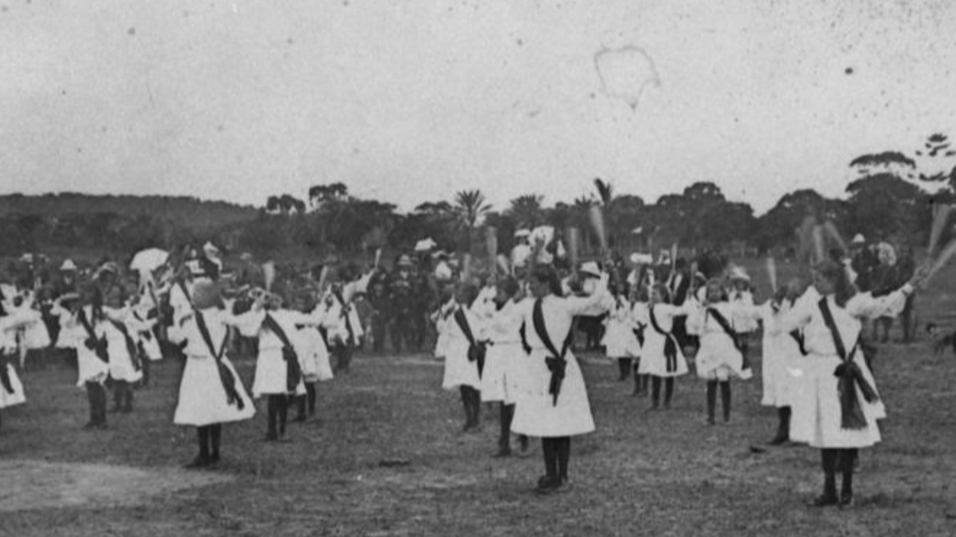 File:StateLibQld 1 90876 Girls from the Bowen Gymnastics Club demonstrate their club swinging abilities, ca. 1913.jpg