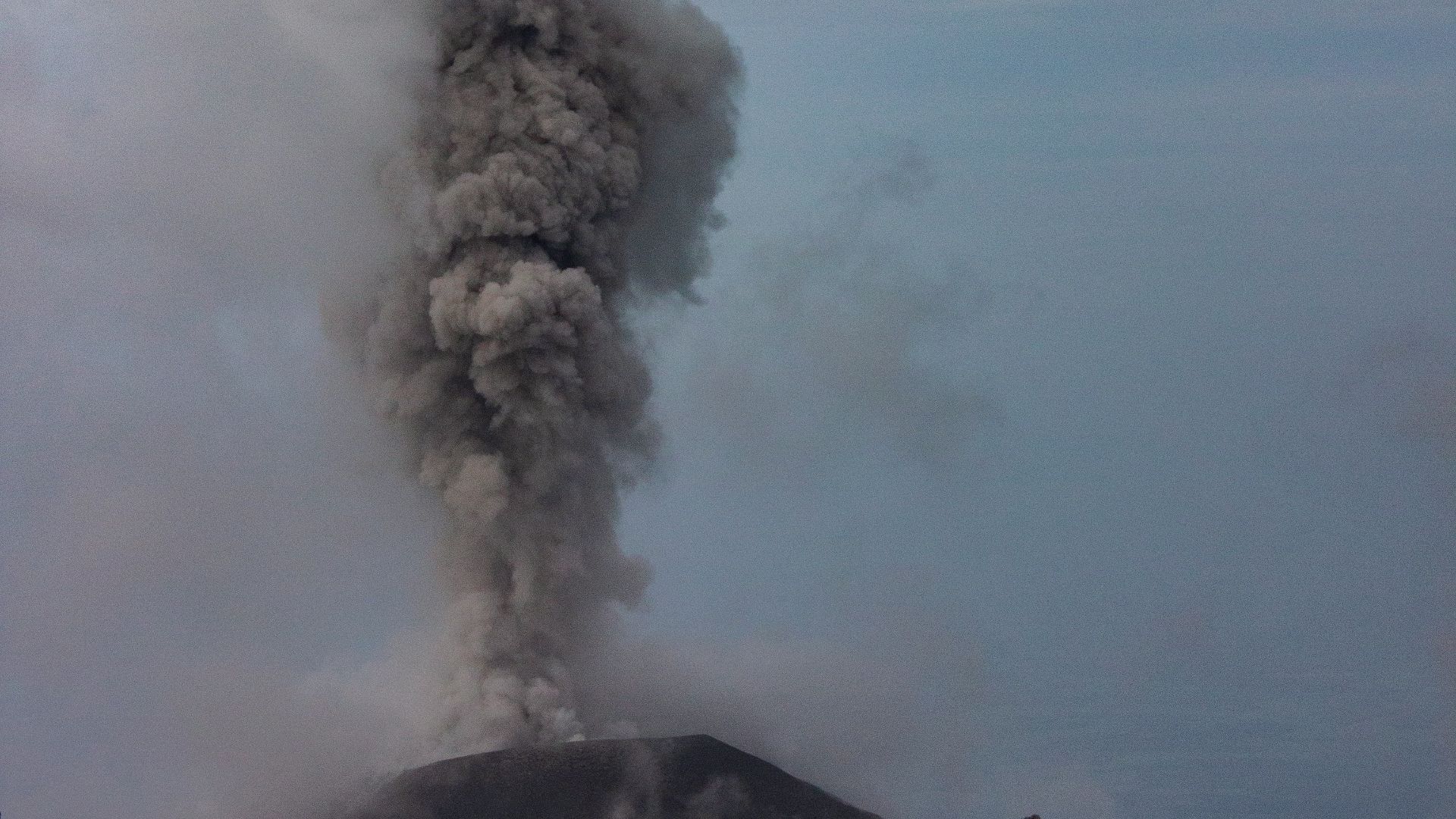 black and white mountain under white clouds during daytime
