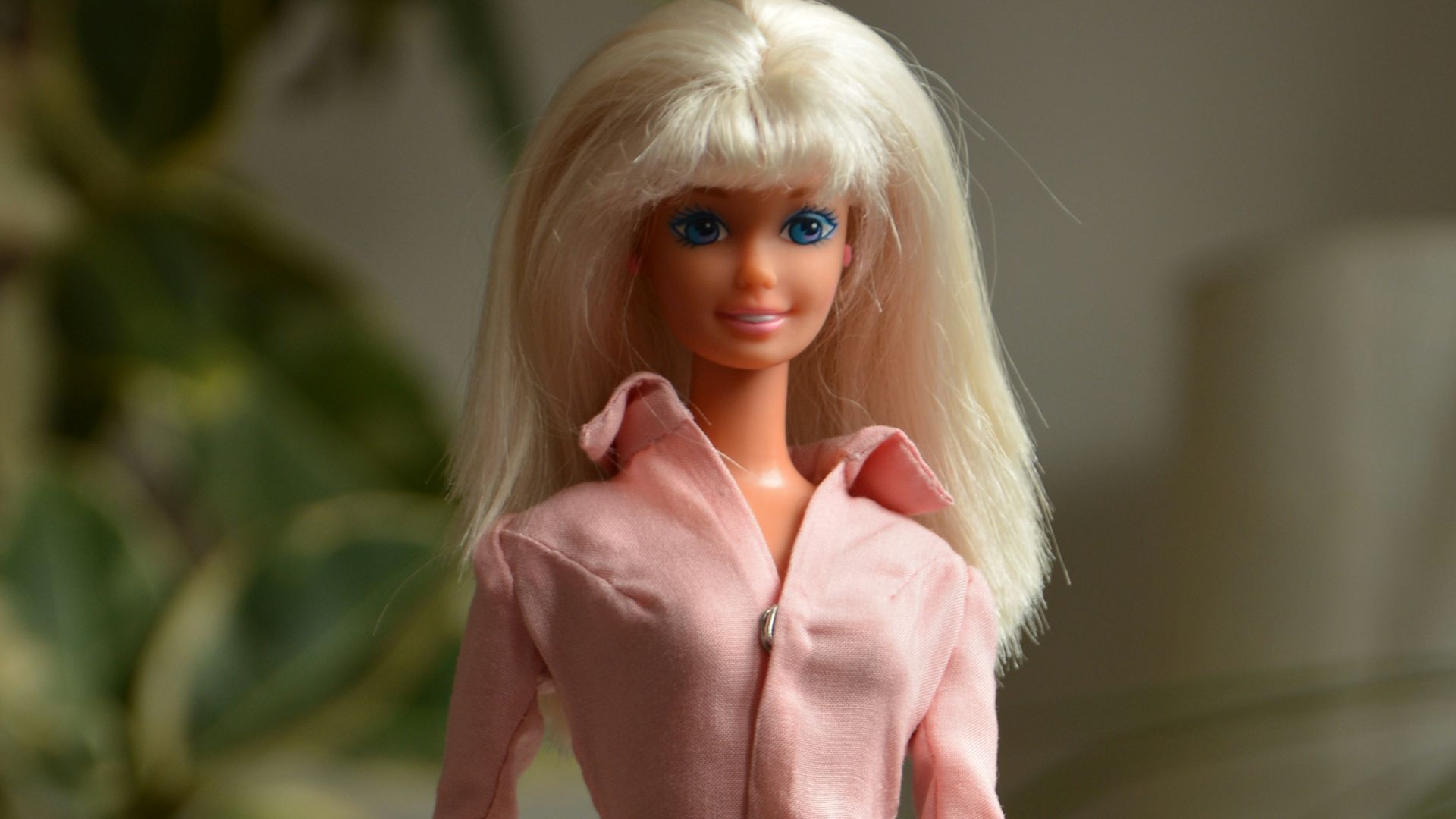 woman in pink long sleeve shirt and gray pants