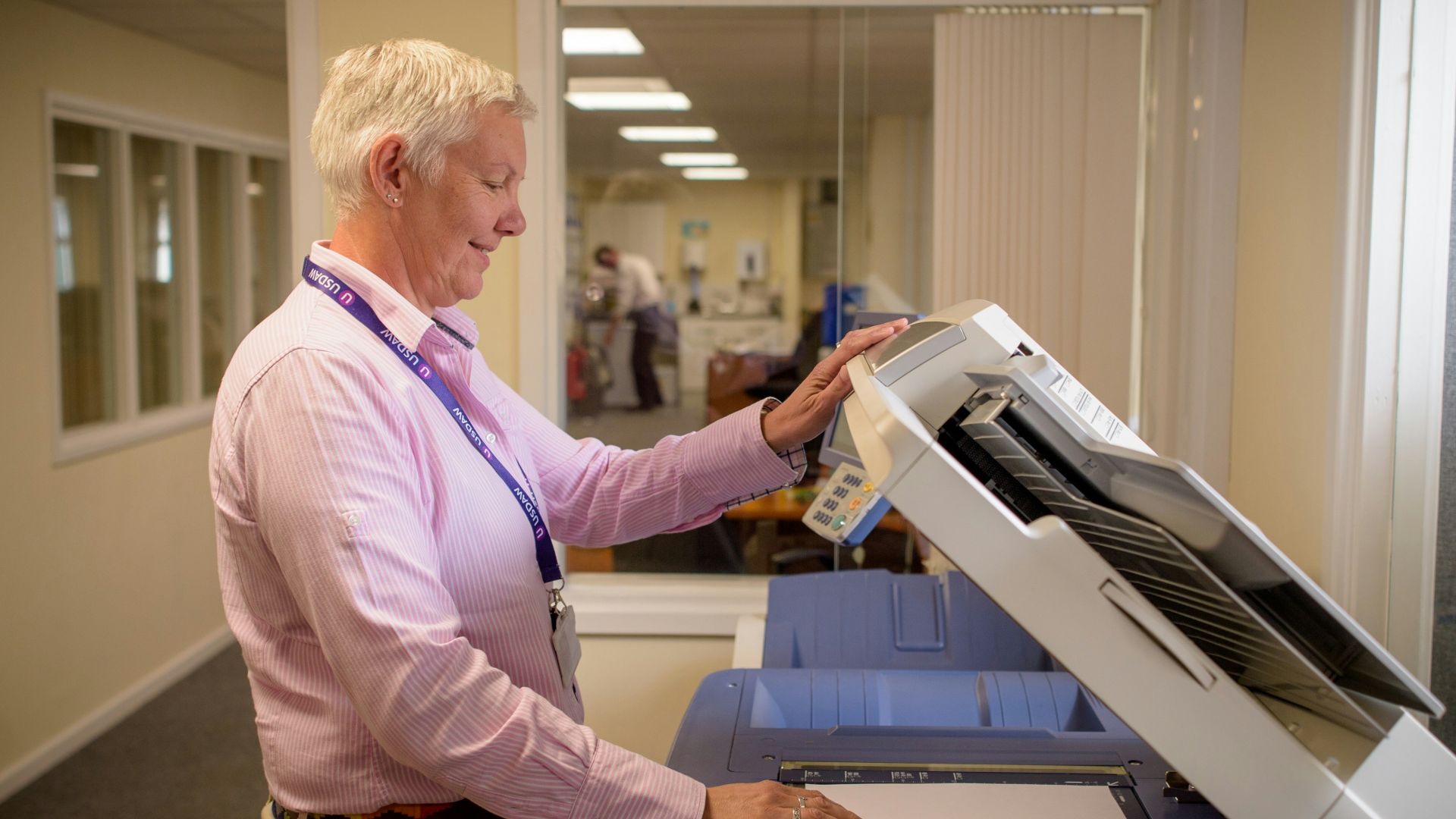 a person holding a tablet