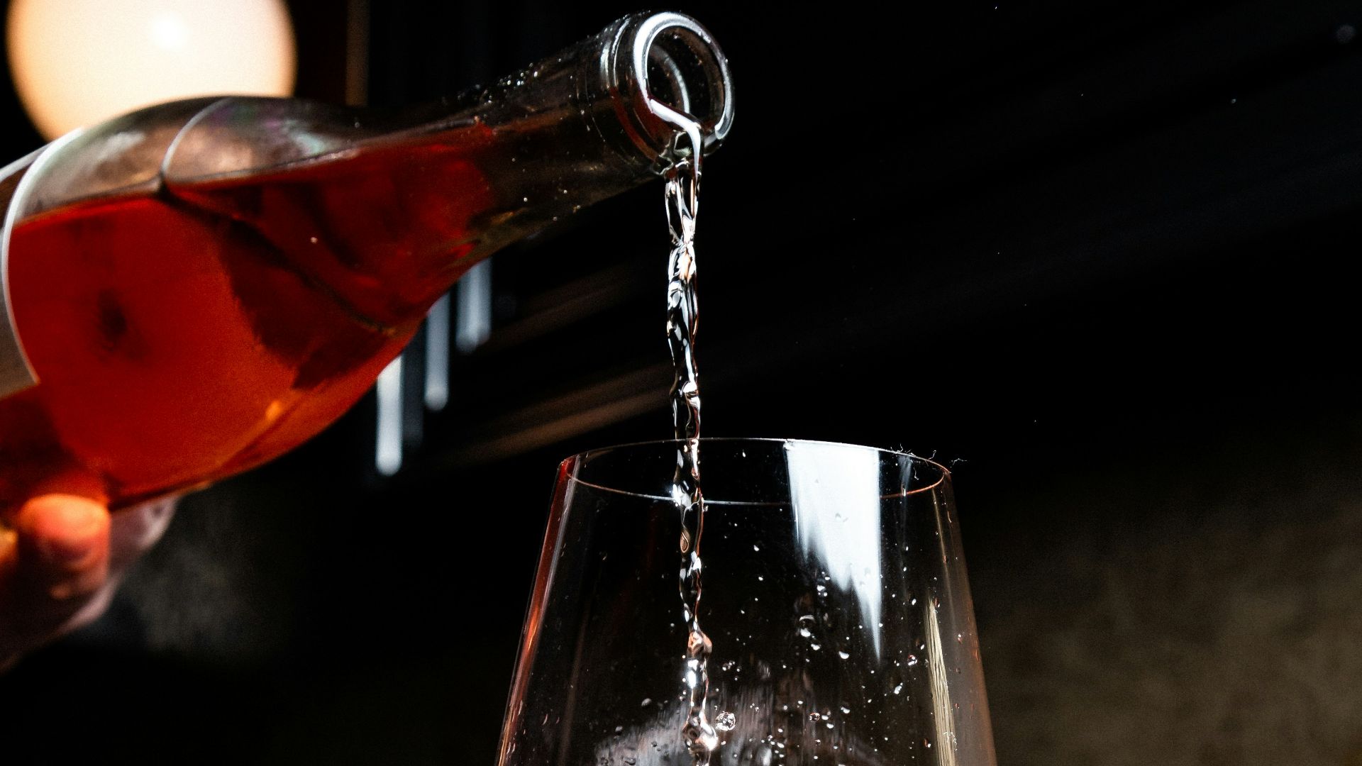 liquor pours in wine glass