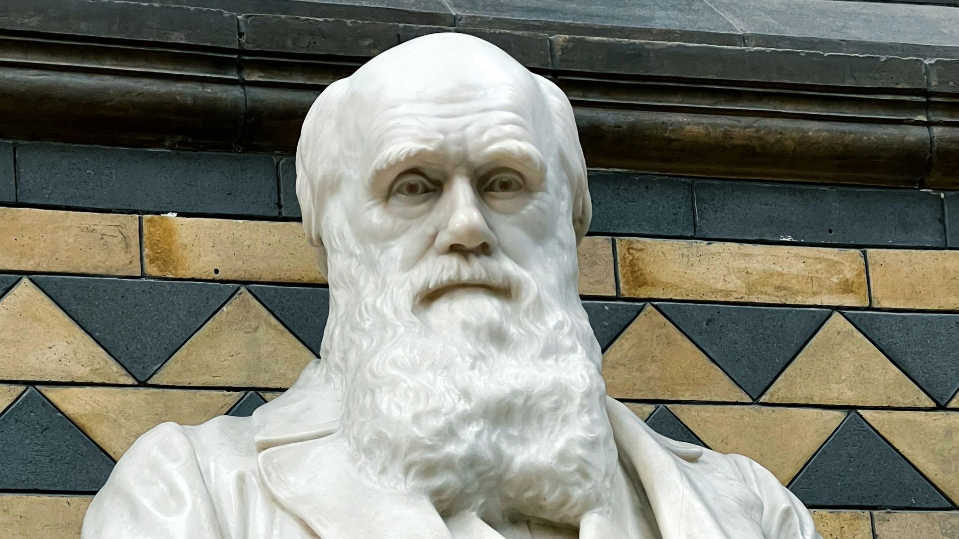a statue of a man with a white beard