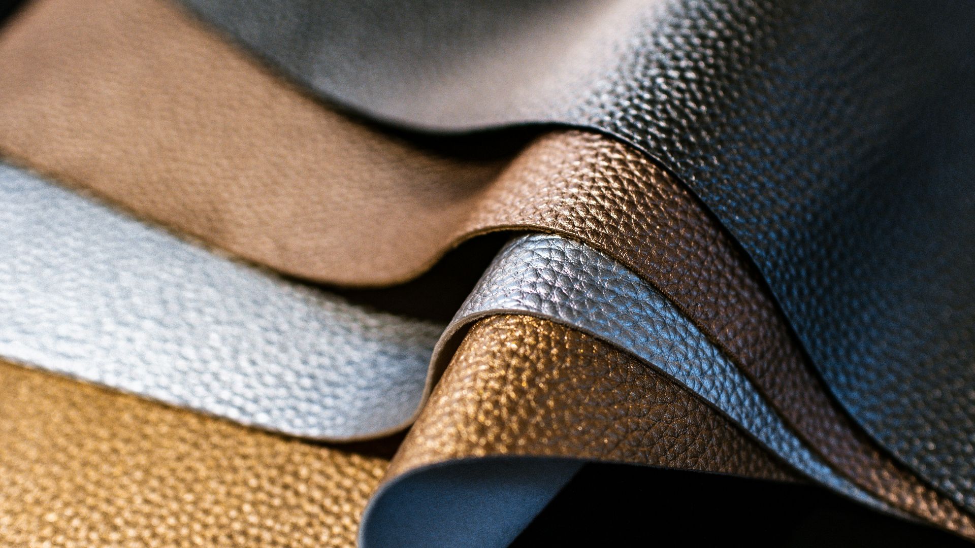 selective-focus of photography of assorted color of leather