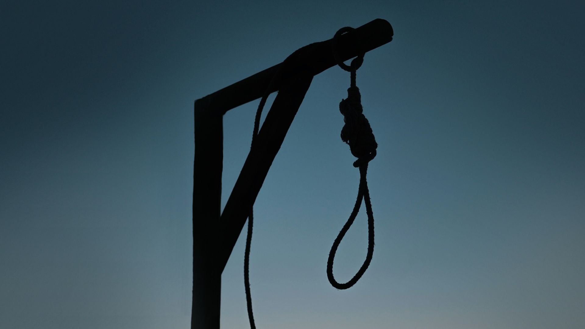 a black and white photo of a telephone pole