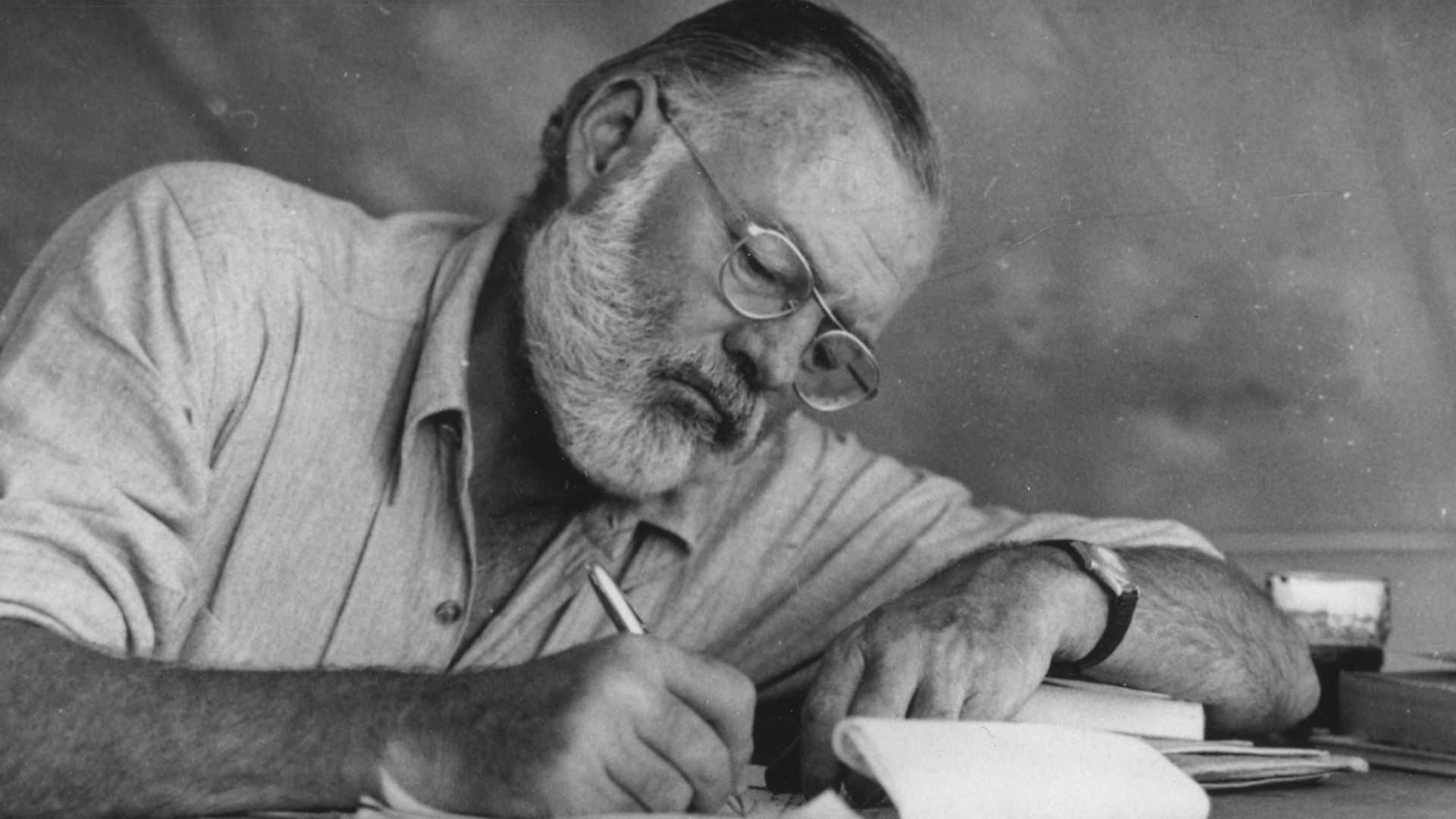 File:Ernest Hemingway Writing at Campsite in Kenya - NARA - 192655.jpg