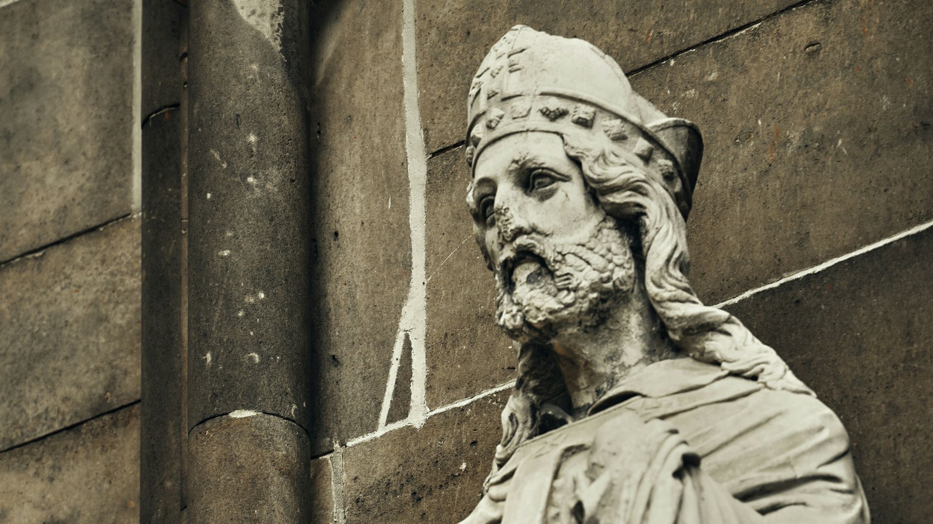 a statue of a man with a beard and a beard