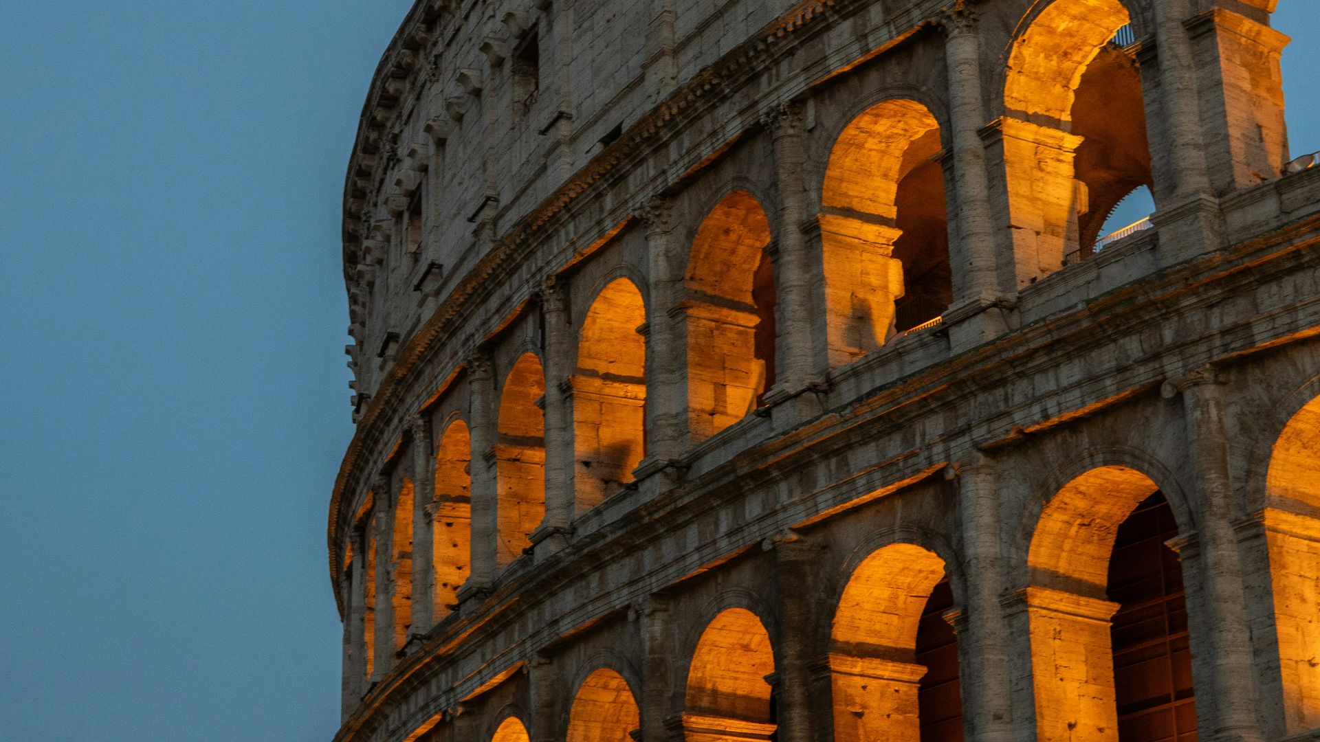 a very tall building with a clock on it's side