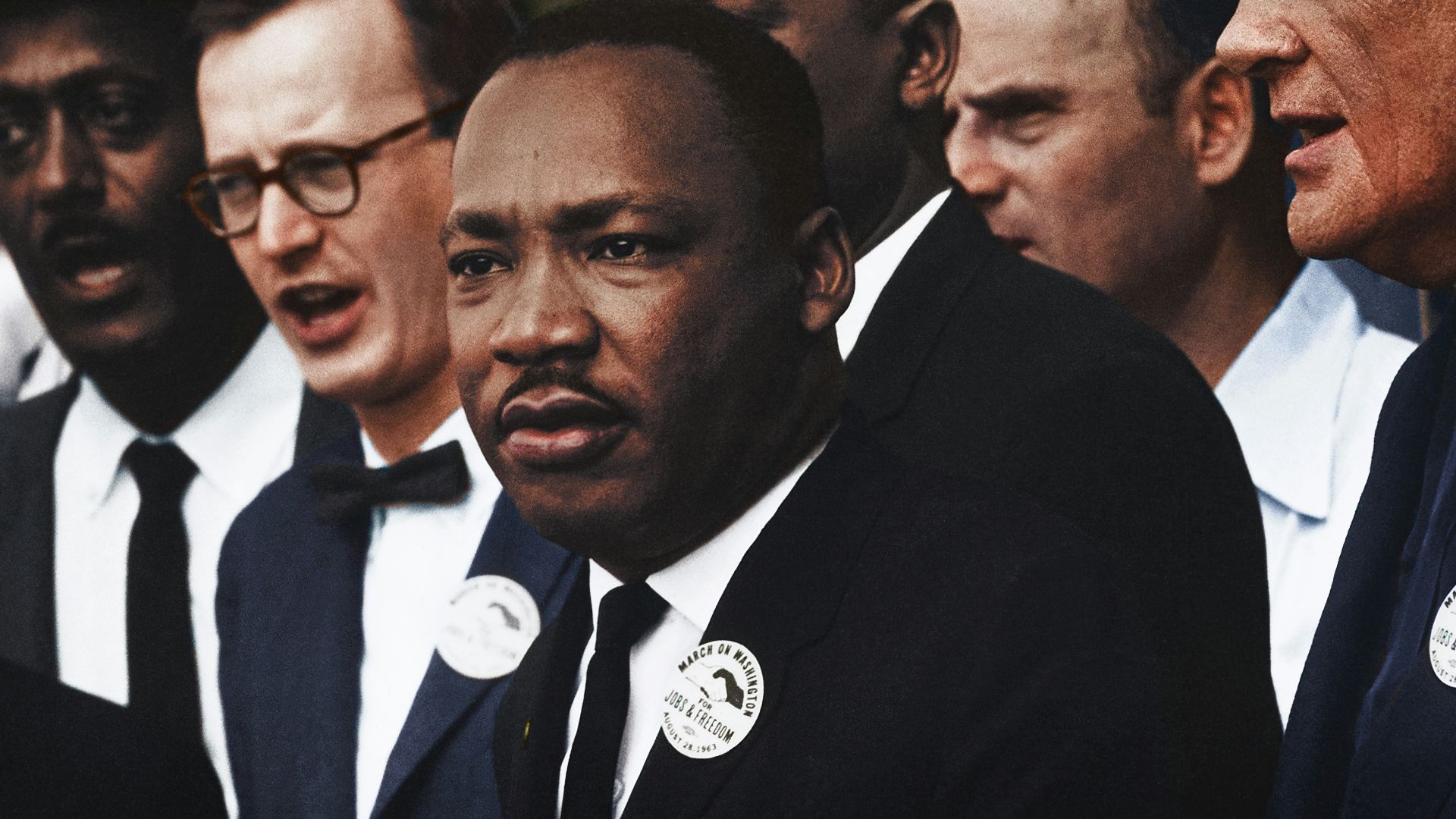 Dr. Martin Luther King, Jr. and Mathew Ahmann in a crowd of demonstrators at the March on Washington