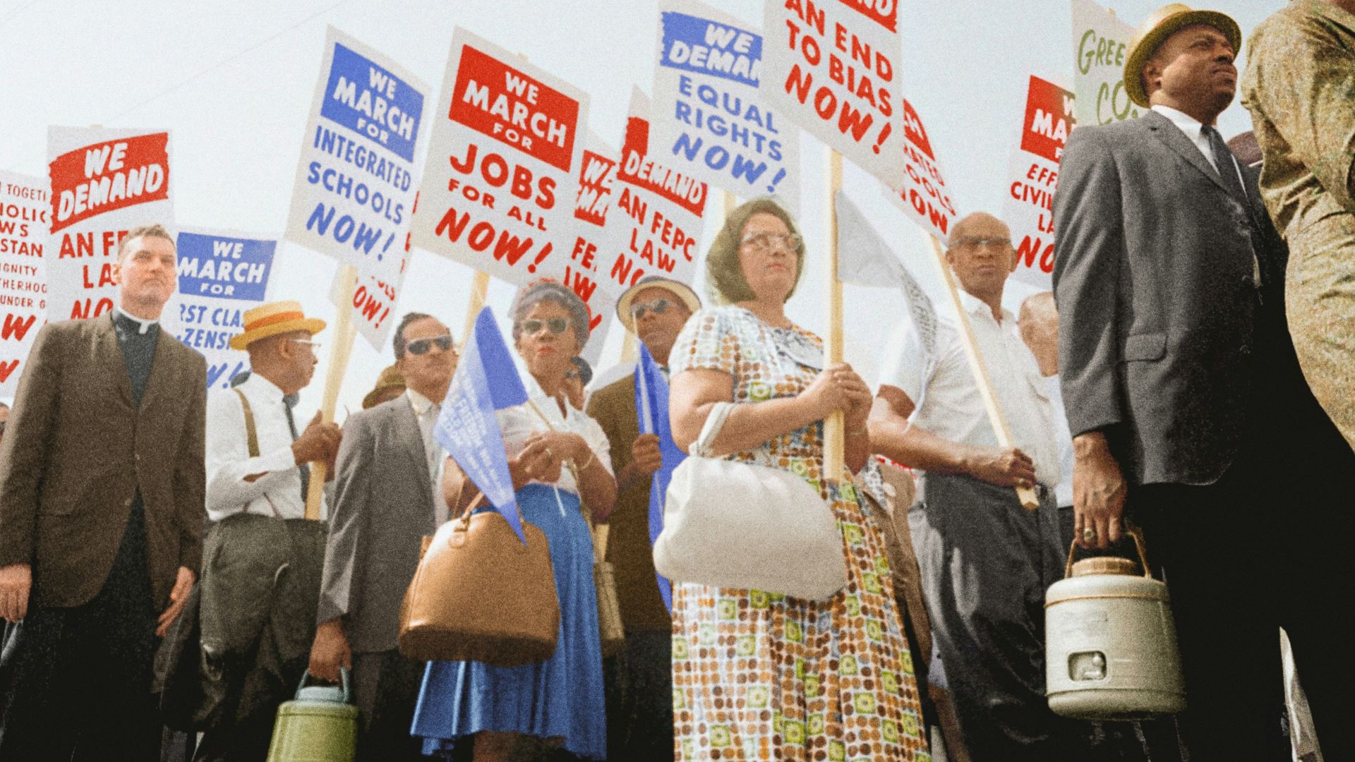 Demonstrators holding signs demanding the right to vote and equal civil rights at the March on Washington