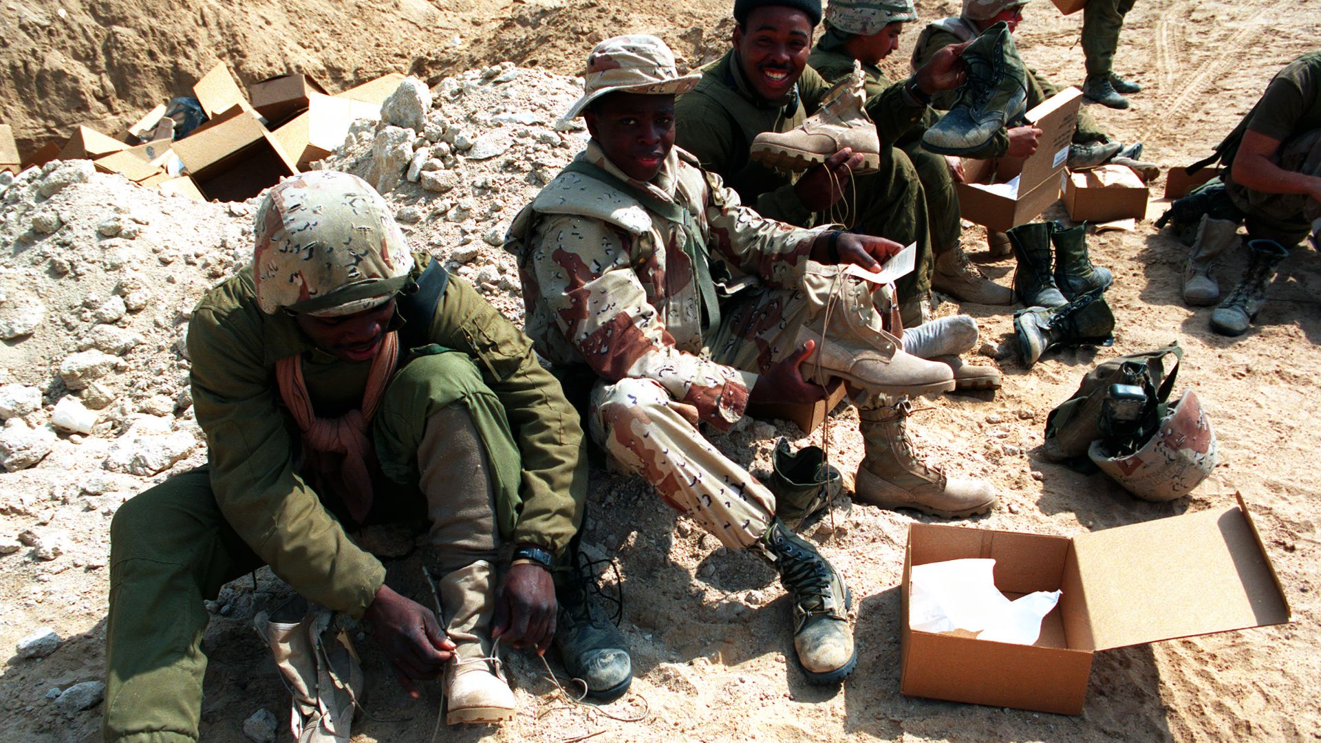 File:AKVIS HC-N - DESERT STORM - Saudia Arabia (SAU) 19-FEB-1991 - Members of C Co., 3rd Tank Battalion, 1ST Marine Division, assigned to Task Force Ripper, try on newly-issued field boots during Operation Desert Storm DM-SC-93-05218(.png).jpg