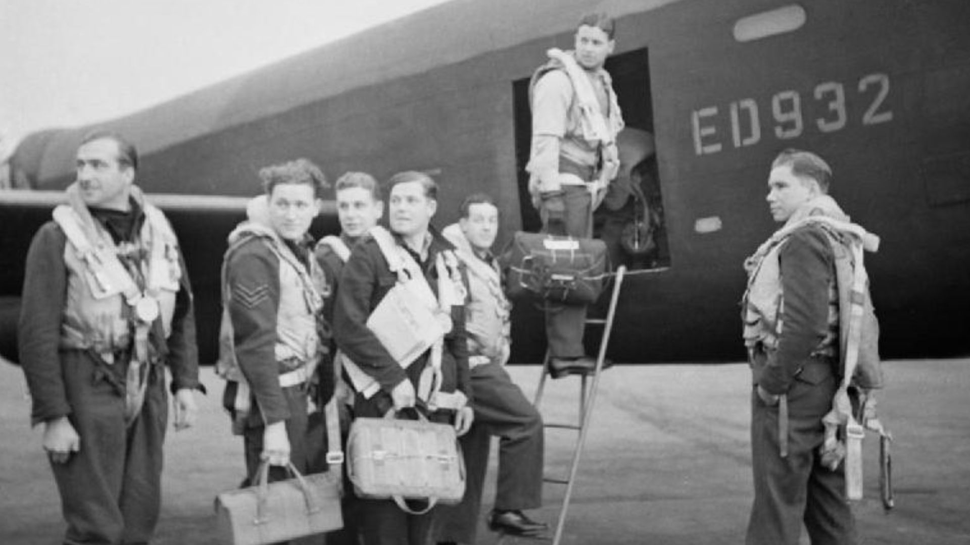 File:Wing Commander Guy Gibson (in door of aircraft) and his crew board their Avro Lancaster bomber for No. 617 Squadron's raid on the Ruhr Dams, 16 May 1943. CH18005.jpg