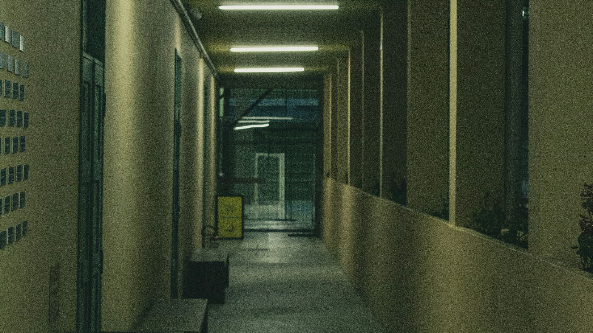 a hallway with a sign