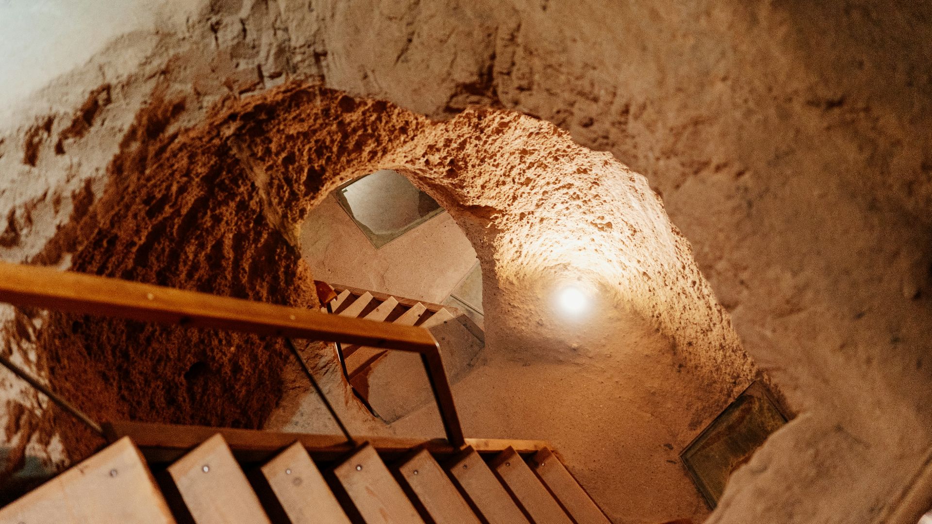 a wooden structure with a light inside