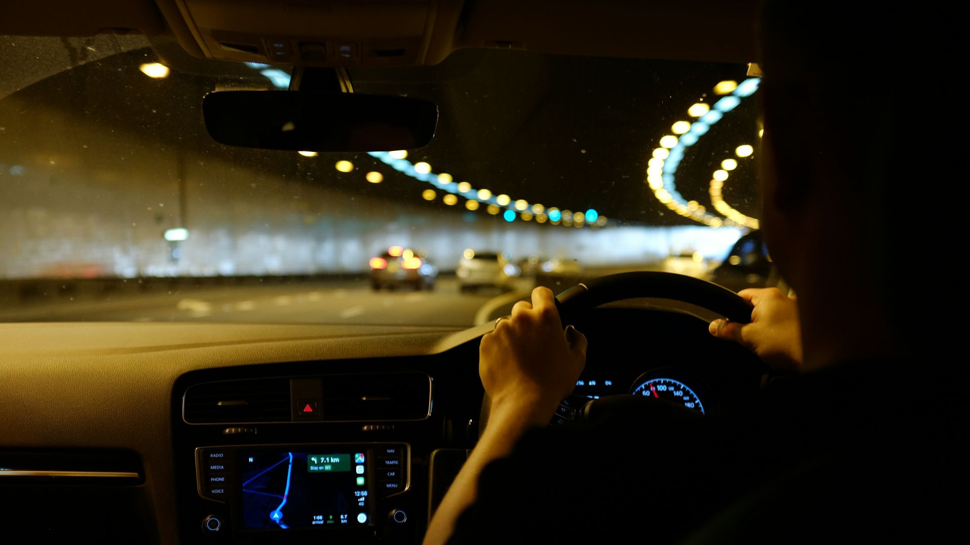 person driving car during night time