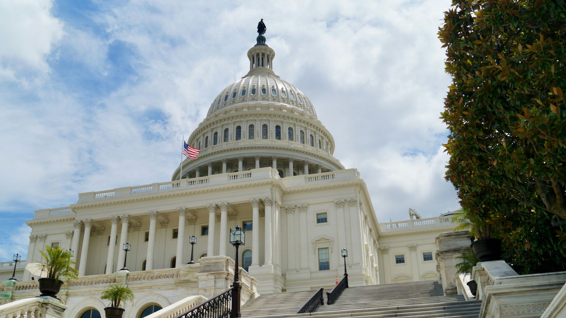 white concrete building under blue sky during daytime