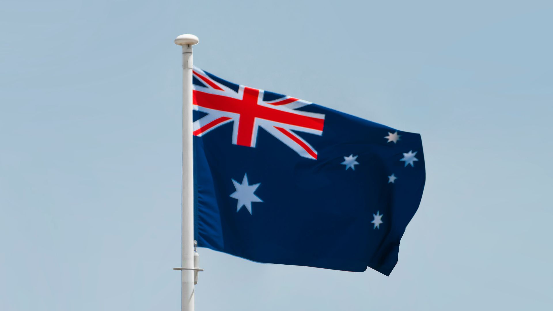 a blue flag on a flagpole