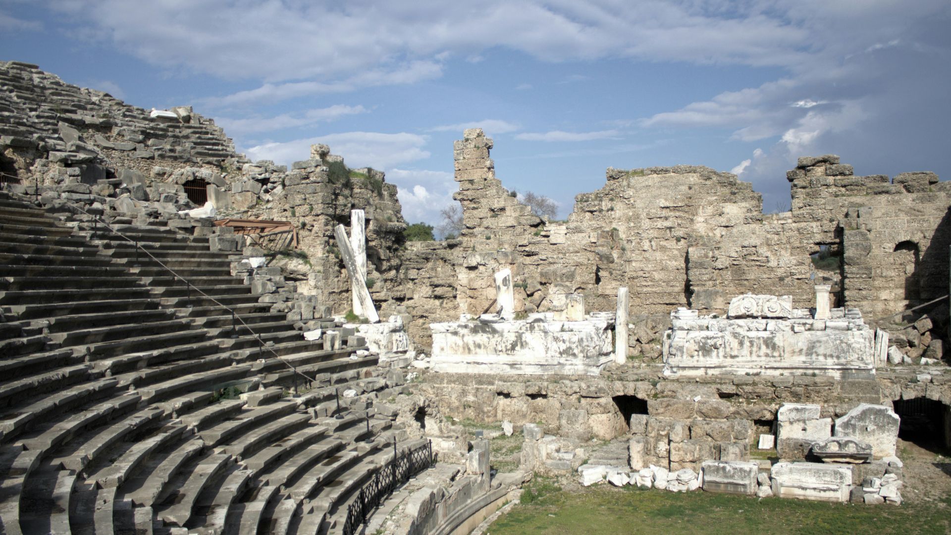 the ruins of a roman theatre in the ruins of a roman city