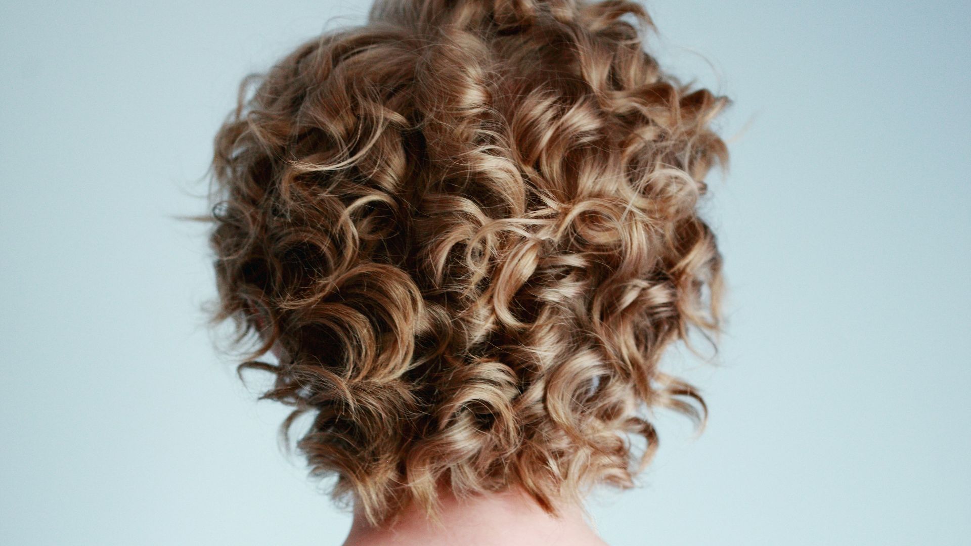 woman wearing white strapless top