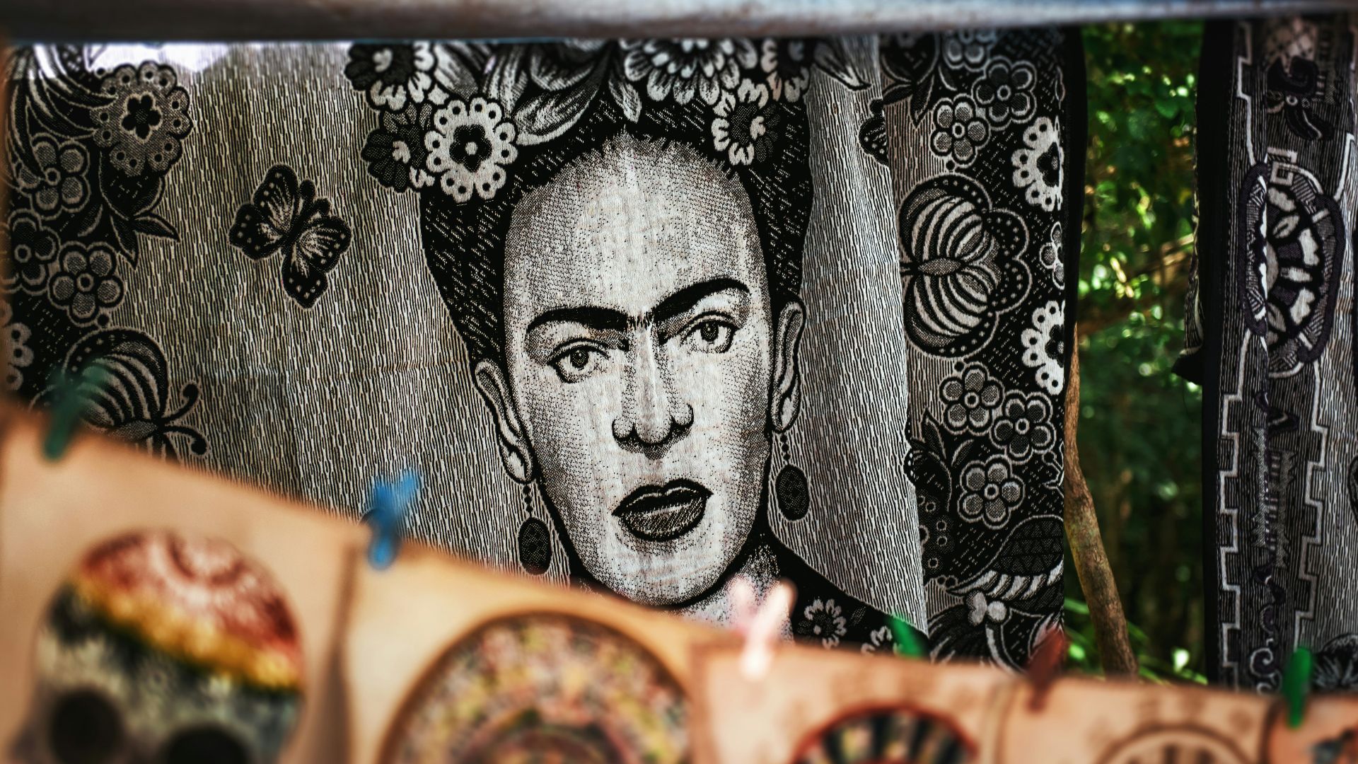 a group of cloths with a picture of a man on them