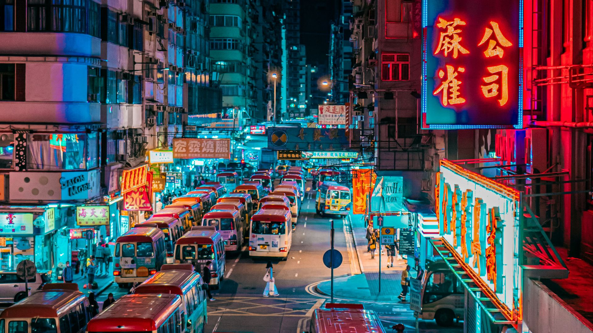 red bus on road during night time