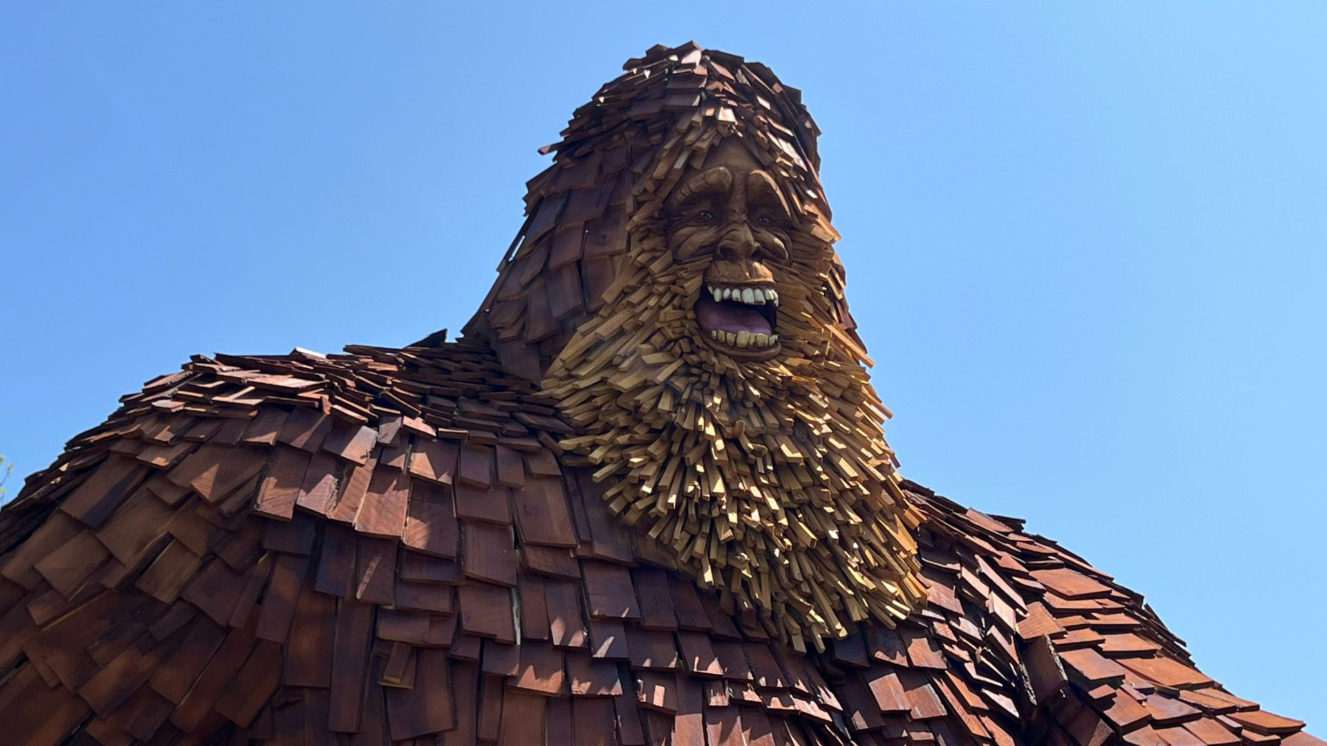 a large statue of a man with a beard