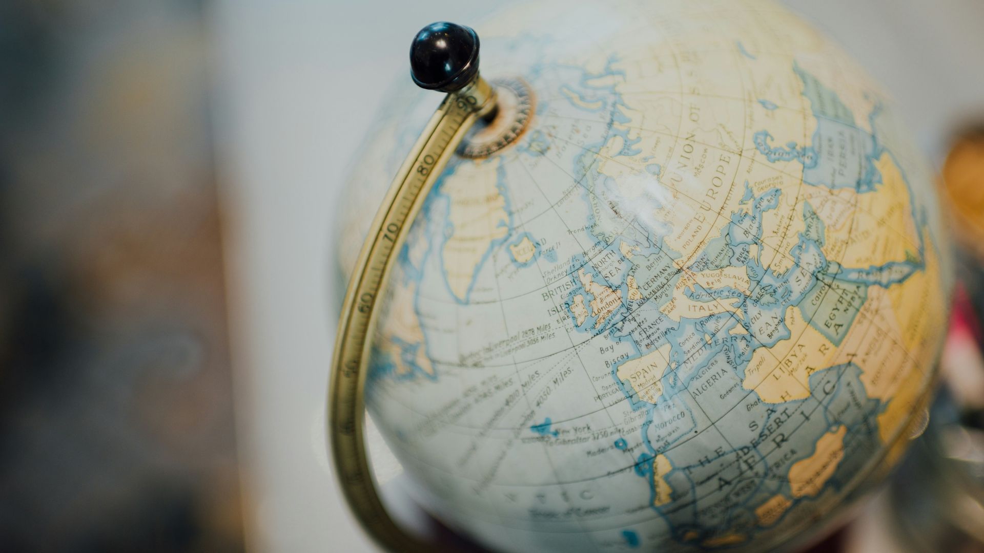 gold and silver desk globe