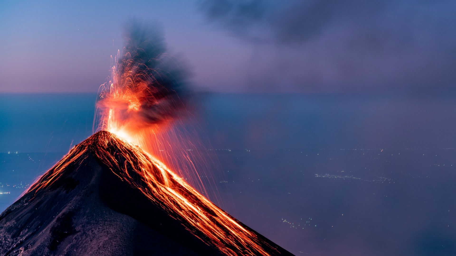 white clouds over snow covered mountain