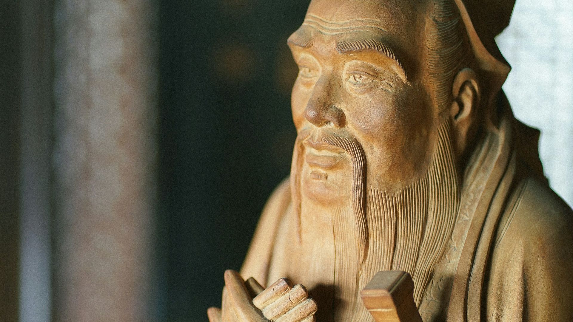 a statue of an old man with a beard