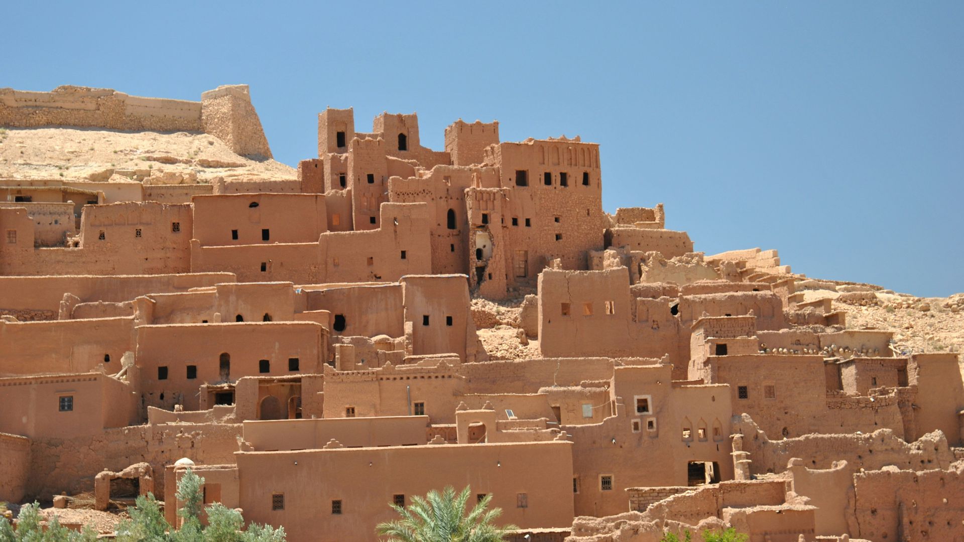 brown concrete building under blue sky during daytime
