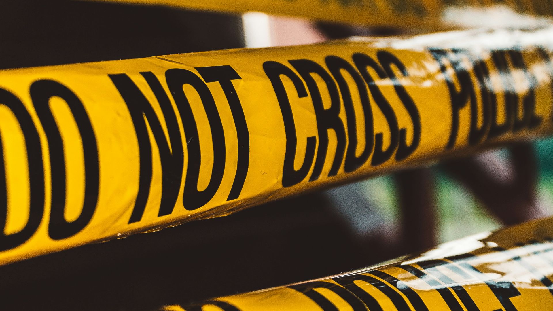 do not cross police barricade tape close-up photography