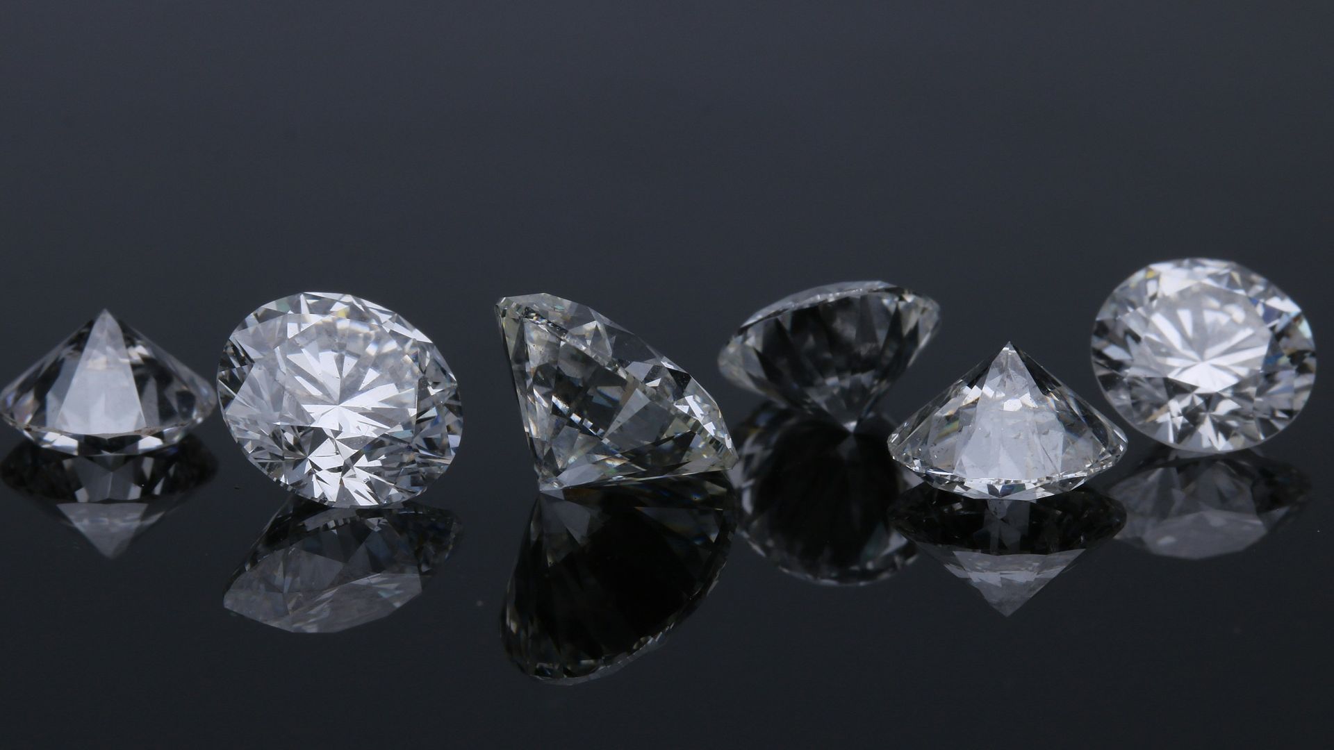 two diamond studded silver rings