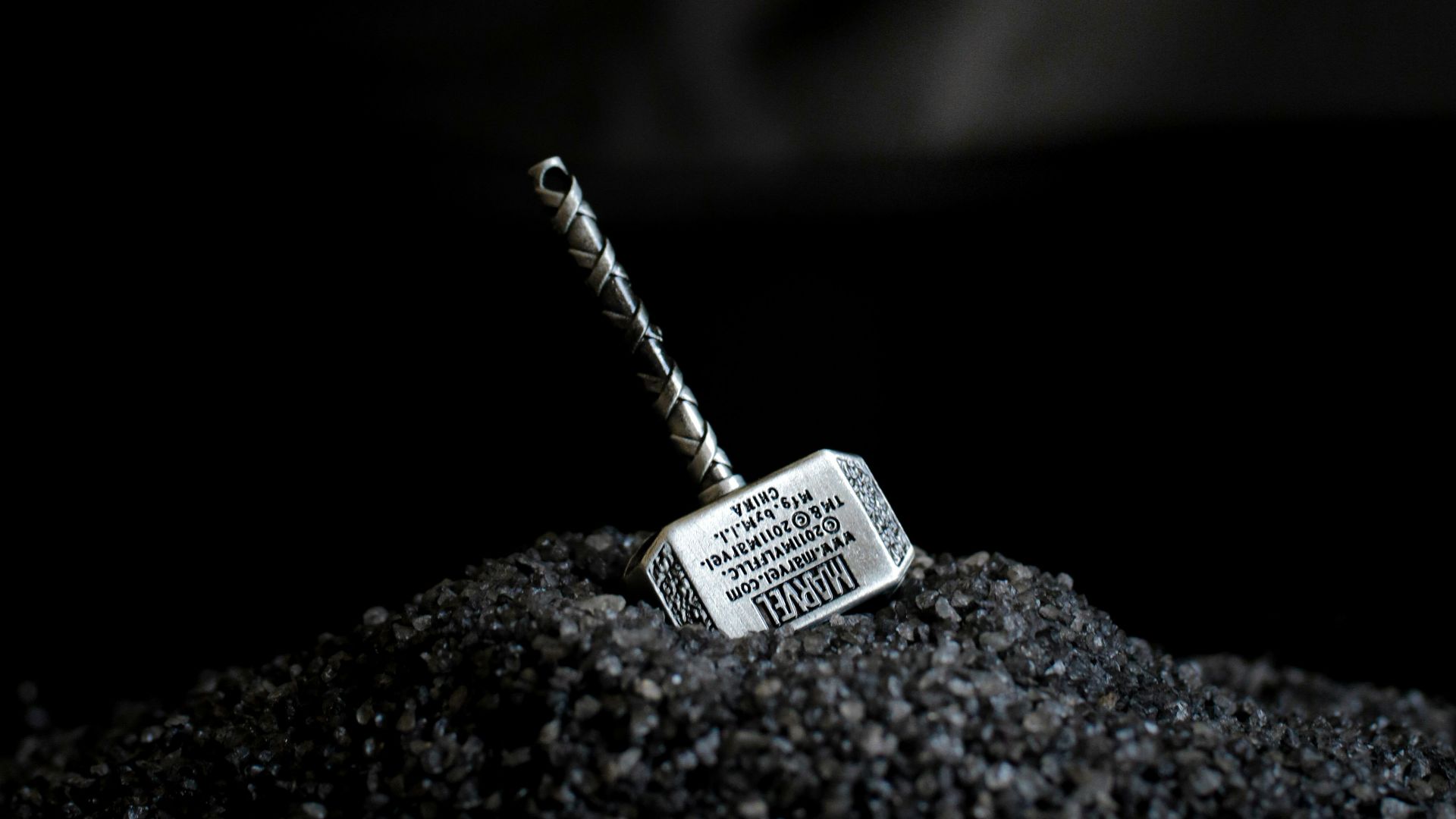 a cigarette on a black surface